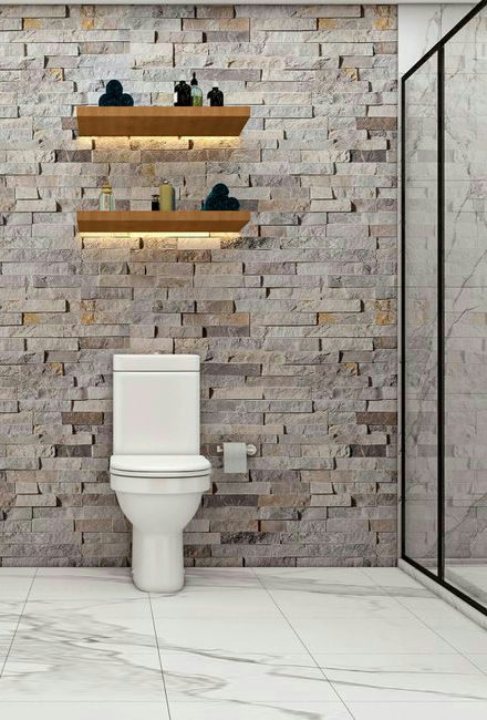 Elegant modern bathroom featuring a stone accent wall and sleek fixtures.